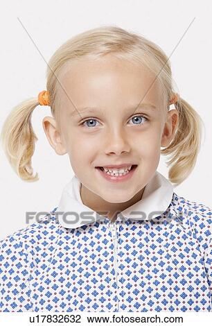 Portrait of a cute girl smiling over white background View Large Photo Image Stock Image - Portrait of a cute girl smiling over white background. Fotosearch