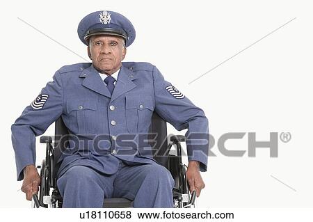 Portrait of a disabled senior male US Air Force officer in wheelchair over gray background View Large Photo Image Stock Photo - Portrait of a disabled senior male US Air Force officer in wheelchair over gray background. Fotosearch