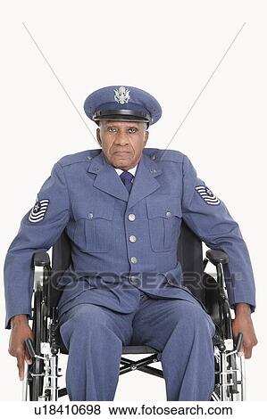Portrait of a disabled senior male US Air Force officer in wheelchair over gray background View Large Photo Image Stock Photo - Portrait of a disabled senior male US Air Force officer in wheelchair over gray background. Fotosearch