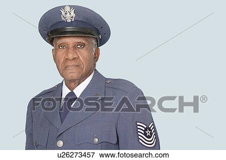 Portrait of a senior male US Air Force officer over light blue background View Large Photo Image Stock Photo - Portrait of a senior male US Air Force officer over light blue background. Fotosearch