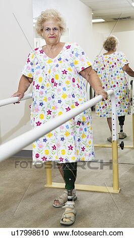 Portrait of a senior woman having ambulatory therapy View Large Photo Image Stock Image - Portrait of a senior woman having ambulatory therapy. Fotosearch
