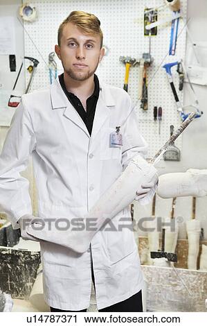 Portrait of a young male technician with prosthetic foot View Large Photo Image Stock Image - Portrait of a young male technician with prosthetic foot. Fotosearch