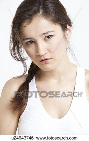 Portrait of beautiful Asian woman in white tank top against white background View Large Photo Image Stock Photograph - Portrait of beautiful Asian woman in white tank top against white background. Fotosearch