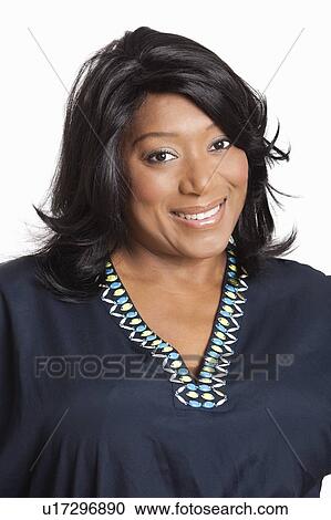 Portrait of casual mixed race woman over white background View Large Photo Image Stock Image - Portrait of casual mixed race woman over white background. Fotosearch