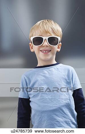 Portrait of Caucasian boy in casuals wearing sunglasses View Large Photo Image Stock Photo - Portrait of Caucasian boy in casuals wearing sunglasses. Fotosearch