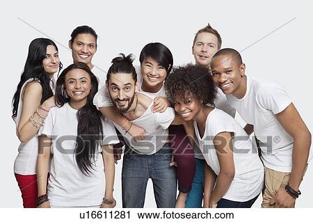Portrait of cheerful young multi-ethnic friends against white background View Large Photo Image Stock Image - Portrait of cheerful young multi-ethnic friends against white background. Fotosearch