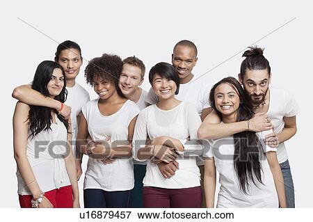 Portrait of four young couples smiling together against white background View Large Photo Image Stock Photo - Portrait of four young couples smiling together against white background. Fotosearch