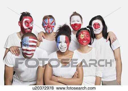 Portrait of Multi-ethnic group of friends with various national flags painted on their faces against white background View Large Photo Image Stock Photo - Portrait of Multi-ethnic group of friends with various national flags painted on their faces against white background. Fotosearch