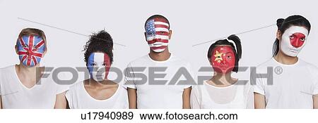 Stock Photo - Portrait of multi-ethnic group with various national flags painted on face against white background. Fotosearch