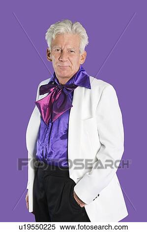 Portrait of senior man wearing old-fashioned suit against purple background View Large Photo Image Stock Photography - Portrait of senior man wearing old-fashioned suit against purple background. Fotosearch