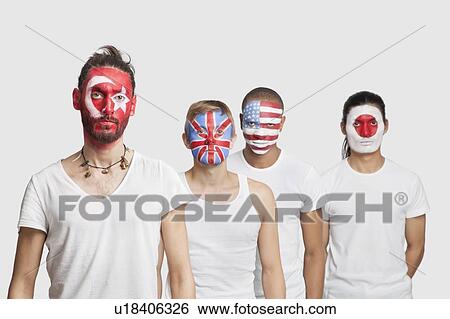 Portrait of serious Multi-ethnic group of male friends with various national flags painted on their faces standing against white background View Large Photo Image Stock Photograph - Portrait of serious Multi-ethnic group of male friends with various national flags painted on their faces standing against white background. Fotosearch