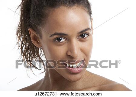 Portrait of young Mixed Race woman suffering from headache against white background View Large Photo Image Stock Image - Portrait of young Mixed Race woman suffering from headache against white background. Fotosearch