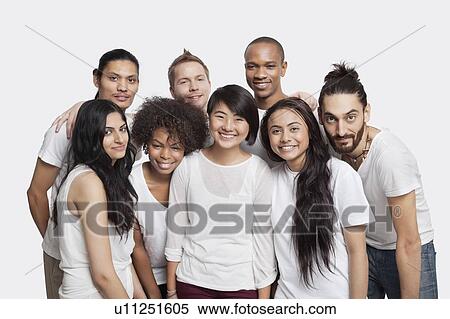 Portrait of young multi-ethnic friends smiling together against white background View Large Photo Image Stock Photography - Portrait of young multi-ethnic friends smiling together against white background. Fotosearch