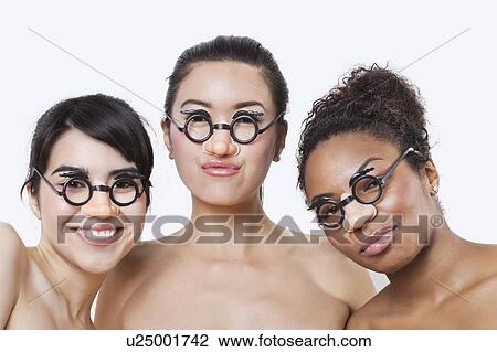 Portrait of young multi-ethnic women wearing groucho glasses over white background View Large Photo Image Stock Image - Portrait of young multi-ethnic women wearing groucho glasses over white background. Fotosearch