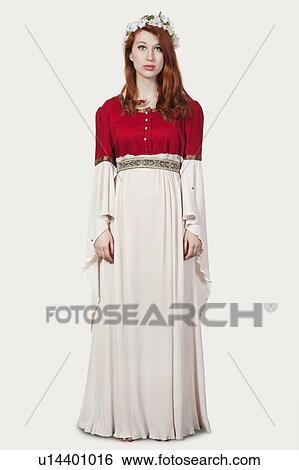 Portrait of young woman in old-fashioned princess costume against gray background View Large Photo Image Stock Photograph - Portrait of young woman in old-fashioned princess costume against gray background. Fotosearch
