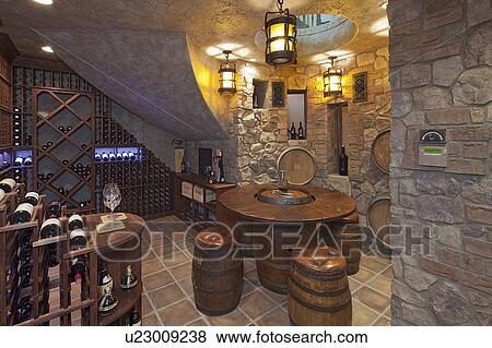 Stock Photo - Private wine cellar in basement of villa. Fotosearch