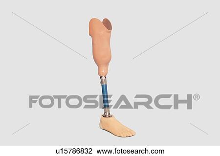 Stock Image - Prosthetic leg over grey background. Fotosearch