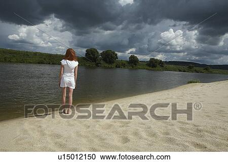 Stock Image - River girl. Fotosearch