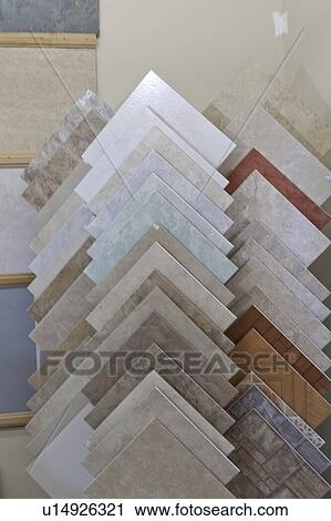 Stock Image - Sample tiles on display in store. Fotosearch