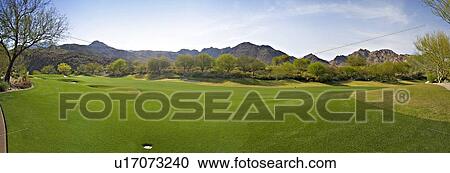 Stock Image - Scenic view of green landscape. Fotosearch