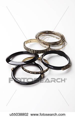 Set of traditional bangles over white background View Large Photo Image Stock Image - Set of traditional bangles over white background. Fotosearch