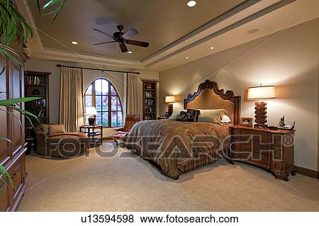 Spacious bedroom in luxury manor house View Large Photo Image Stock Photo - Spacious bedroom in luxury manor house. Fotosearch