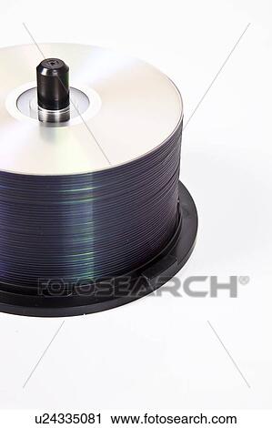 Stack of compact discs on a spindle over white background View Large Photo Image Stock Image - Stack of compact discs on a spindle over white background. Fotosearch