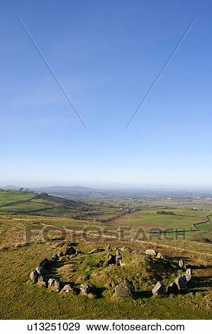 Stone circle at Loughcrew Cairn T, Ireland View Large Photo Image Stock Photo - Stone circle at Loughcrew Cairn T, Ireland. Fotosearch