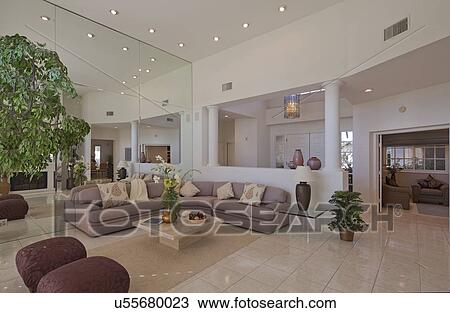 Stock Image - Stylish living room interior of luxury mansion. Fotosearch