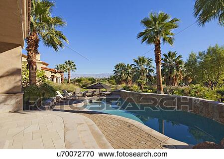 Swimming pool in luxury mansion View Large Photo Image Stock Image - Swimming pool in luxury mansion. Fotosearch