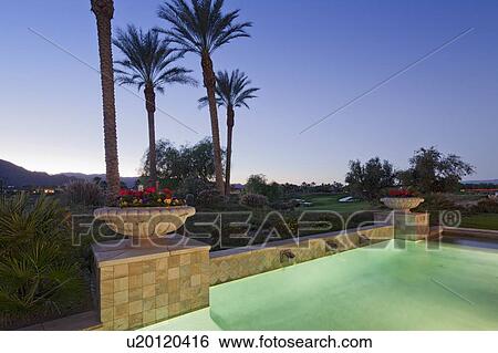 Swimming pool with landscape in background View Large Photo Image Stock Photograph - Swimming pool with landscape in background. Fotosearch