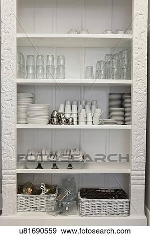 Tableware arranged in shelf View Large Photo Image Stock Photo - Tableware arranged in shelf. Fotosearch