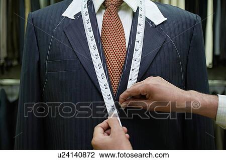 Tailor measuring business man for suit View Large Photo Image Stock Image - Tailor measuring business man for suit. Fotosearch