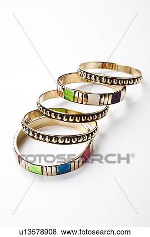 Traditional bangles over white background View Large Photo Image Stock Photo - Traditional bangles over white background. Fotosearch