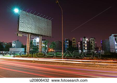 Traffic Light Trails Below Billboard on Road View Large Photo Image Stock Image - Traffic Light Trails Below Billboard on Road. Fotosearch