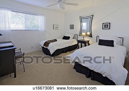 Stock Image - Twin beds in luxury mansion. Fotosearch