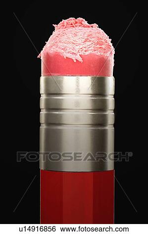 Stock Photograph - Used pencil eraser black background. Fotosearch