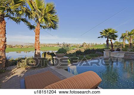 Picture - View of landscape from mansion swimming pool. Fotosearch