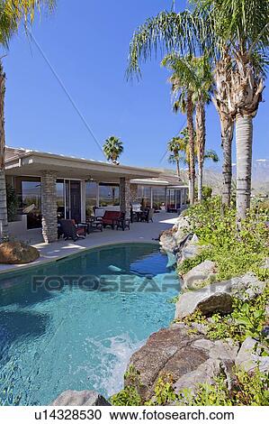 View of luxury manor house with swimming pool View Large Photo Image Stock Image - View of luxury manor house with swimming pool. Fotosearch