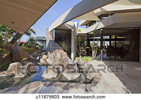 Stock Image - View of luxury mansion. Fotosearch