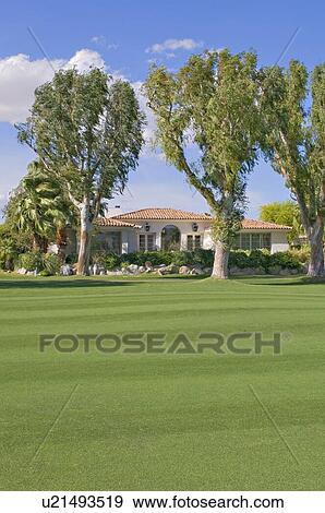 View of manor house with lawn in foreground View Large Photo Image Stock Photo - View of manor house with lawn in foreground. Fotosearch