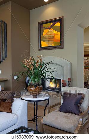 Stock Photo - View of modern fireplace in living room. Fotosearch