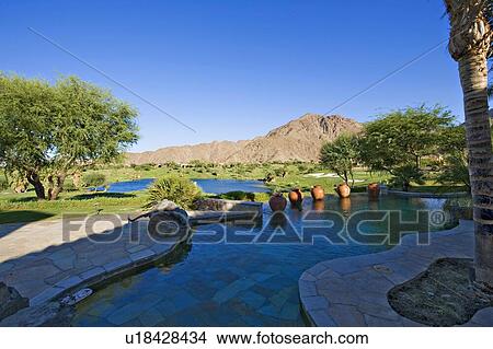 Picture - View of mountain from swimming pool. Fotosearch