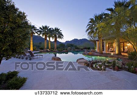 View of mountains with swimming pool from luxury mansion View Large Photo Image Stock Image - View of mountains with swimming pool from luxury mansion. Fotosearch