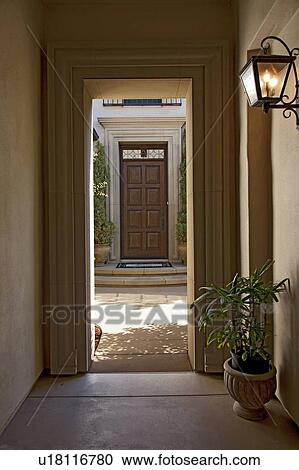 Stock Image - View through doorway of luxury villa. Fotosearch