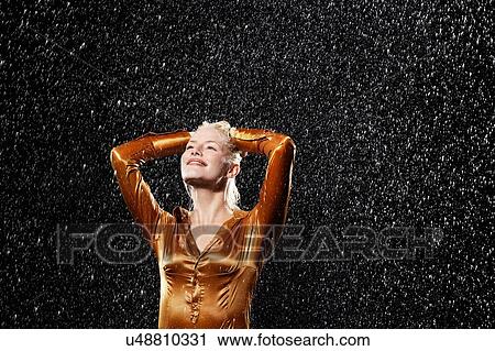 Woman Standing in Rain View Large Photo Image Stock Image - Woman Standing in Rain. Fotosearch