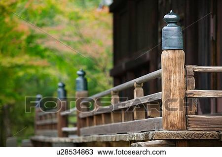 Stock Image - Wooden hut in Japanese garden. Fotosearch