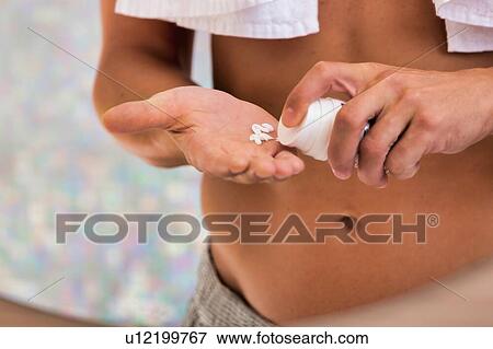 Young attractive man applying facial foam View Large Photo Image Stock Photo - Young attractive man applying facial foam. Fotosearch