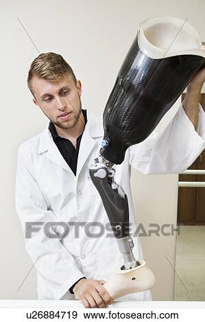 Young technician working on prosthetic leg View Large Photo Image Stock Photo - Young technician working on prosthetic leg. Fotosearch