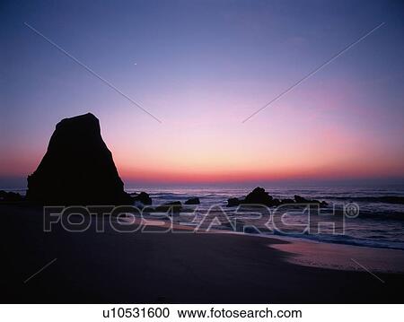 Stock Image - Beach After Sunset. Fotosearch
